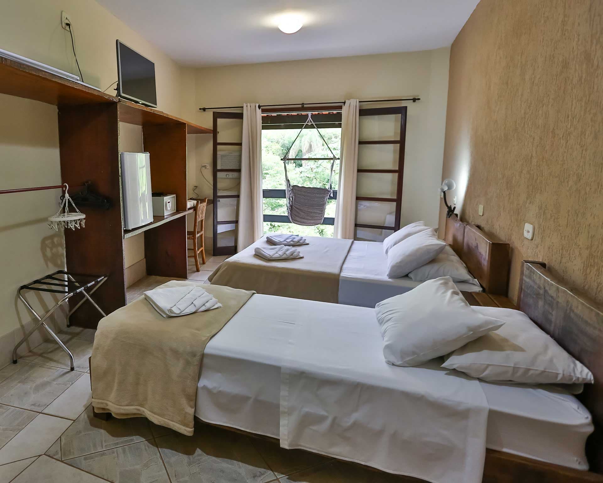 Suíte com vista para a natureza no Hotel Fazenda Parque dos Sonhos